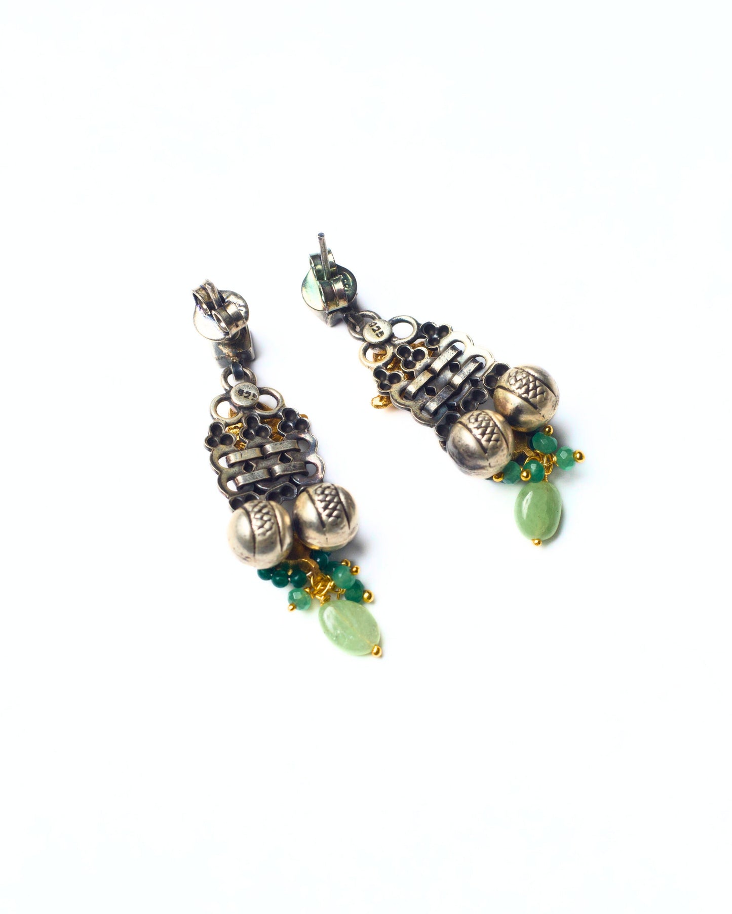 Back view of The Fish & Fig Drops showing the detailed silver framework, hanging construction, and handcrafted assembly behind the fish motif.