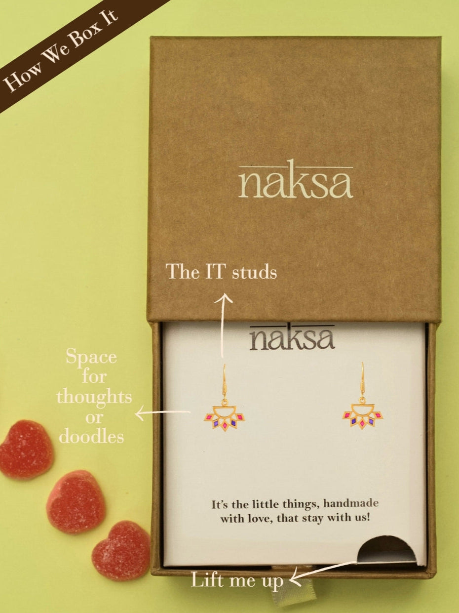 Confetti Drops by Naksa—colorful lotus-inspired danglers with pink and purple enamel on gold-polished 925 silver and fishhook setting.