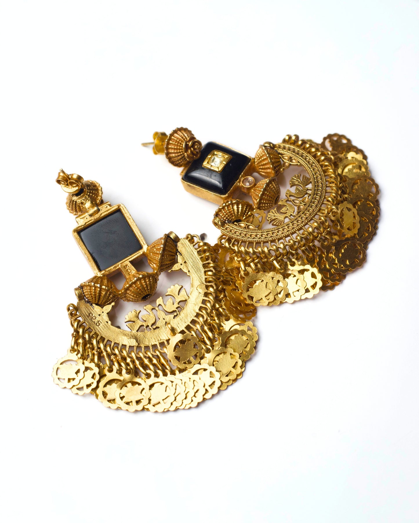 Back view of The Obsidian Darbar Earrings showing the detailed metal framework, stud backing, crescent construction, and attachment points for the fringe elements.