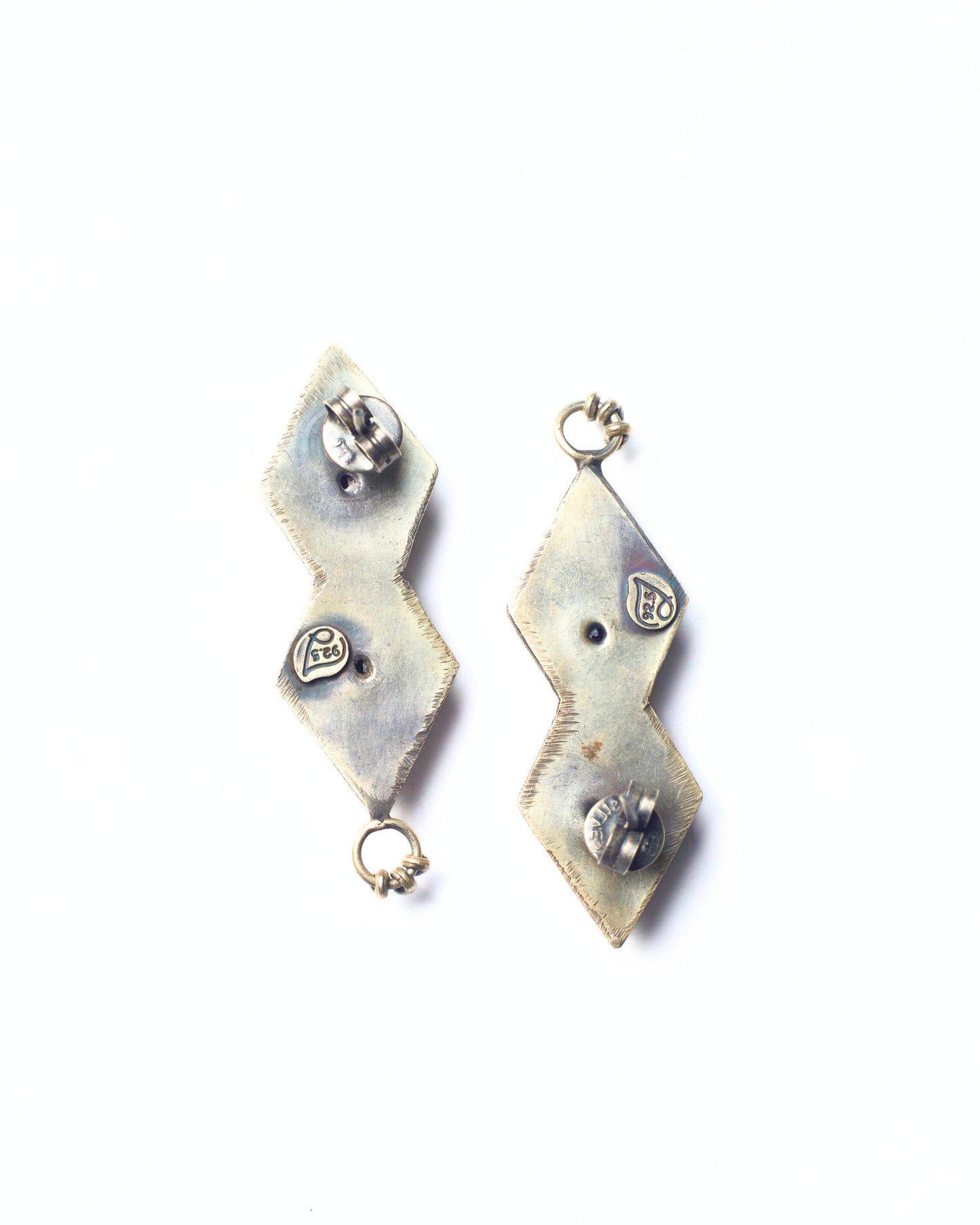 Back view of Mirror Kite Earrings showing the smooth silver backing, structural joins, and hanging loop detail of the stacked kite design.