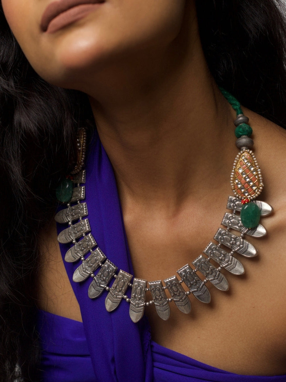 Form of the Feminine Necklace – 92.5 silver sculpted goddess face necklace with peach kundan, green stone drops, and adjustable thread dori