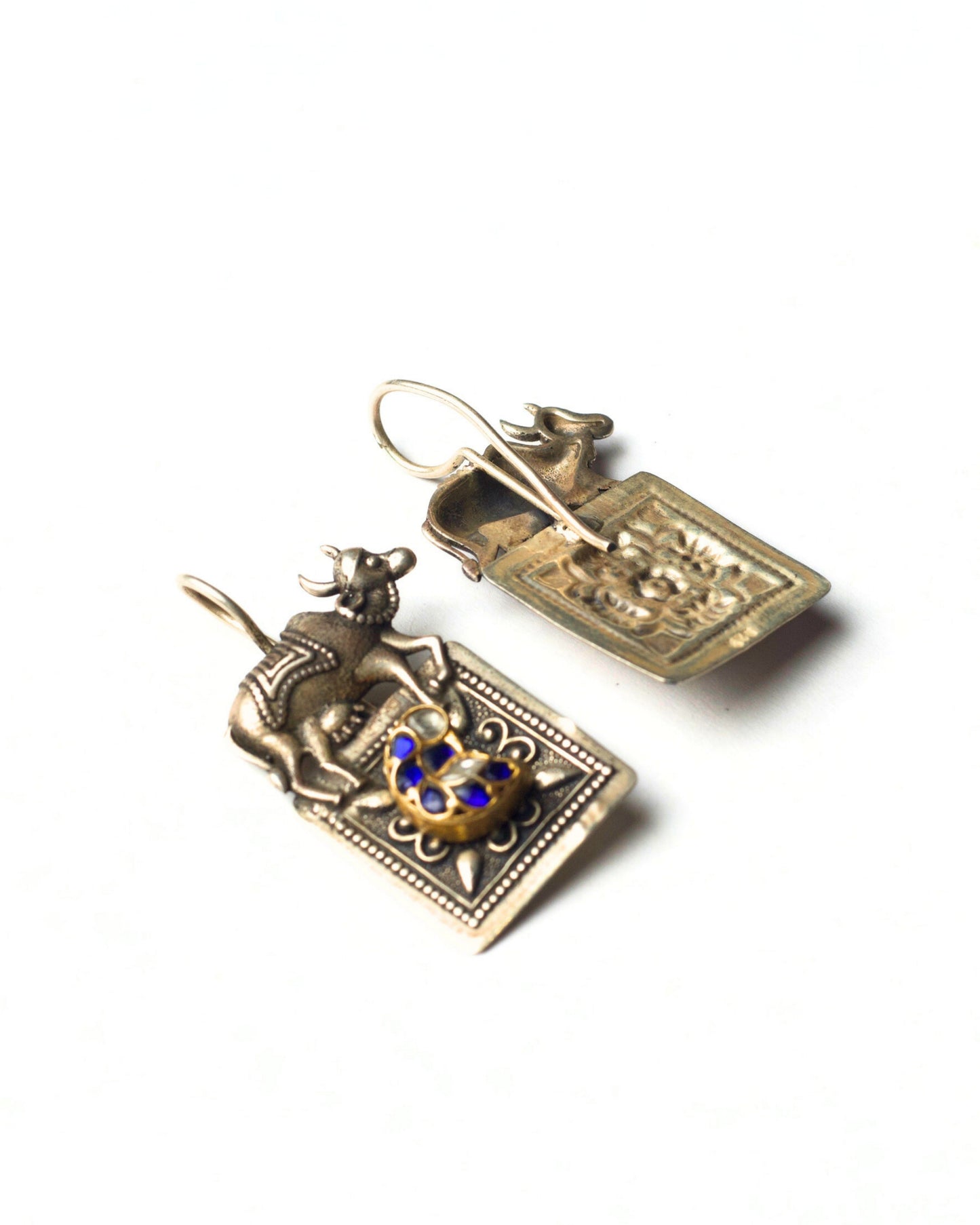 Back view of Split Bull Earrings in 925 silver showing handcrafted silver base and structural detailing