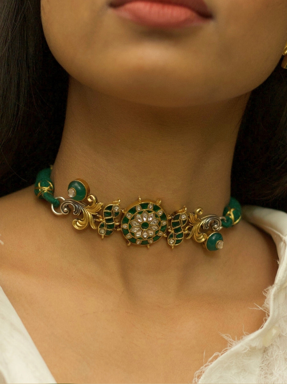 Fusion-style green kundan choker in pure 925 silver with parrot motifs and textured two-tone elements by Naksa.