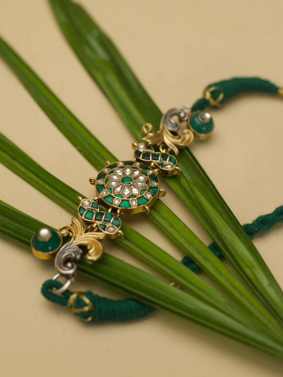 Fusion-style green kundan choker in pure 925 silver with parrot motifs and textured two-tone elements by Naksa.