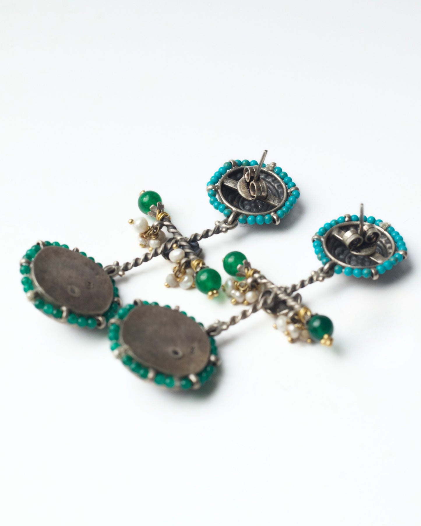 Back of 925 silver geometric earrings with carved stone discs by Naksa