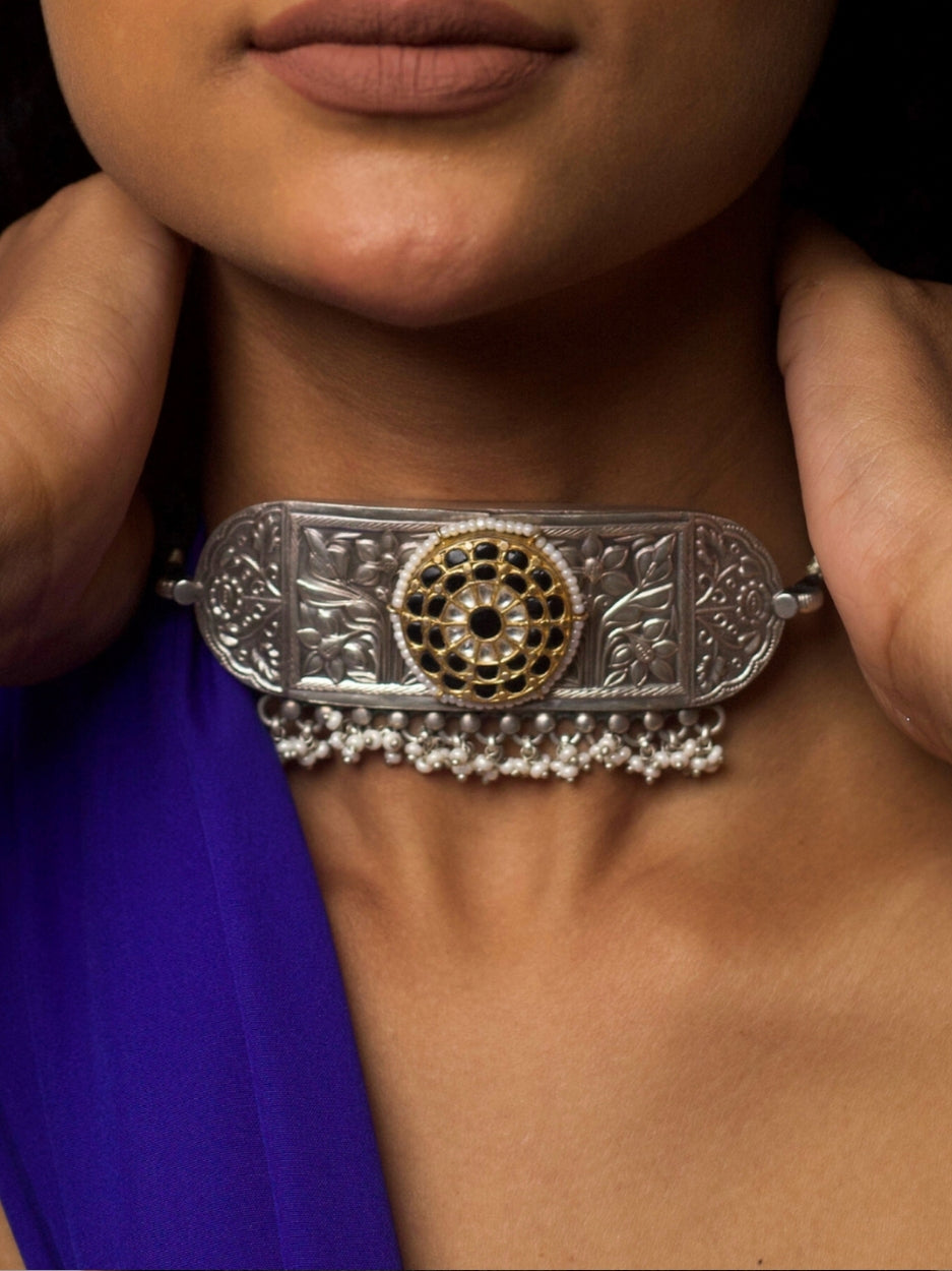 Hand-engraved 92.5 silver choker with floral motif, black enamel centre, kundan detailing, and pearl fringe – The Floral Vault Choker by Naksa