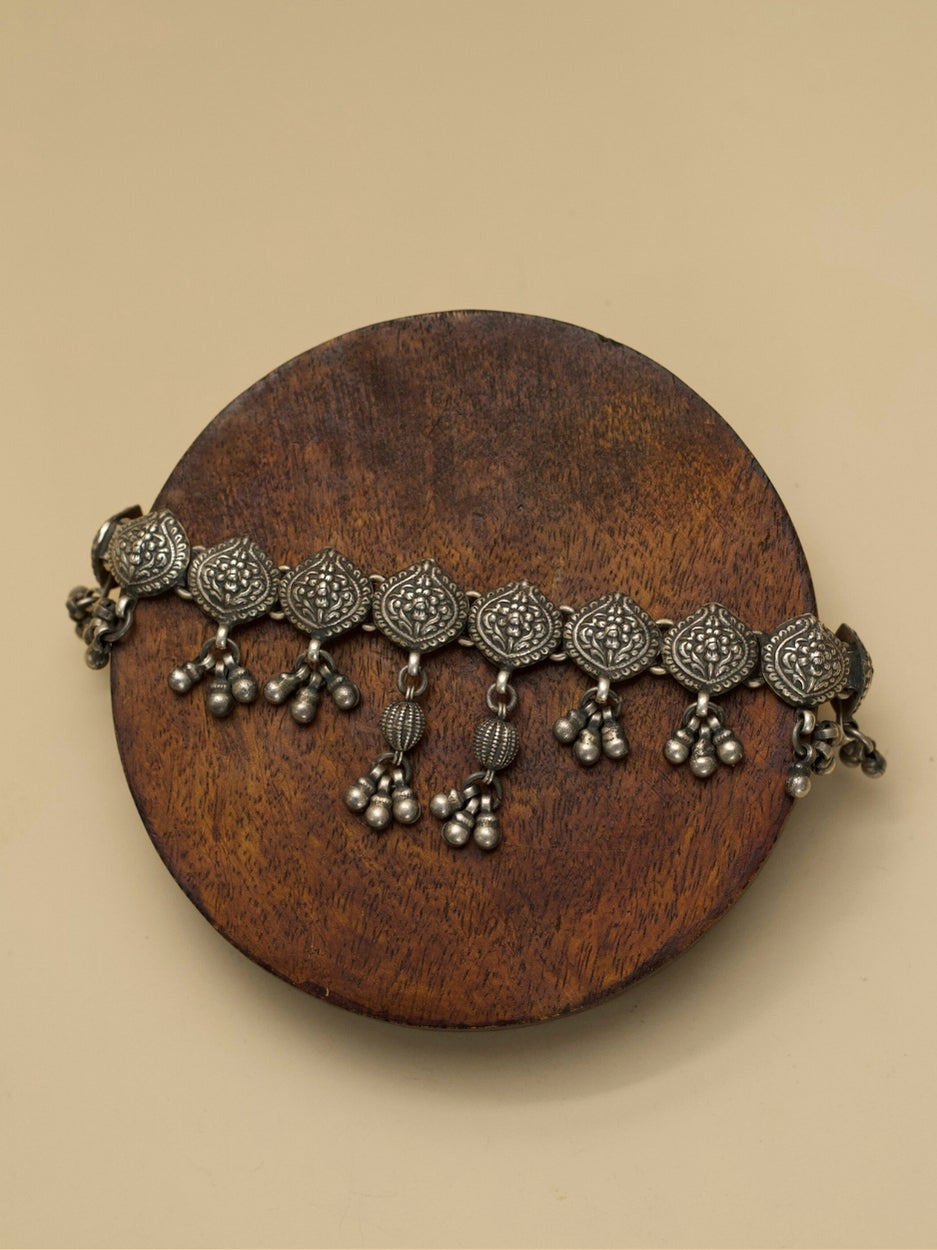 Purna Kalash Choker by Naksa—oxidized 925 silver choker with kalash motifs and ghungroo danglers, inspired by Indian temple iconography.
