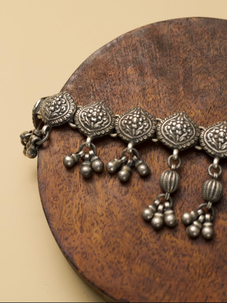 Purna Kalash Choker by Naksa—oxidized 925 silver choker with kalash motifs and ghungroo danglers, inspired by Indian temple iconography.