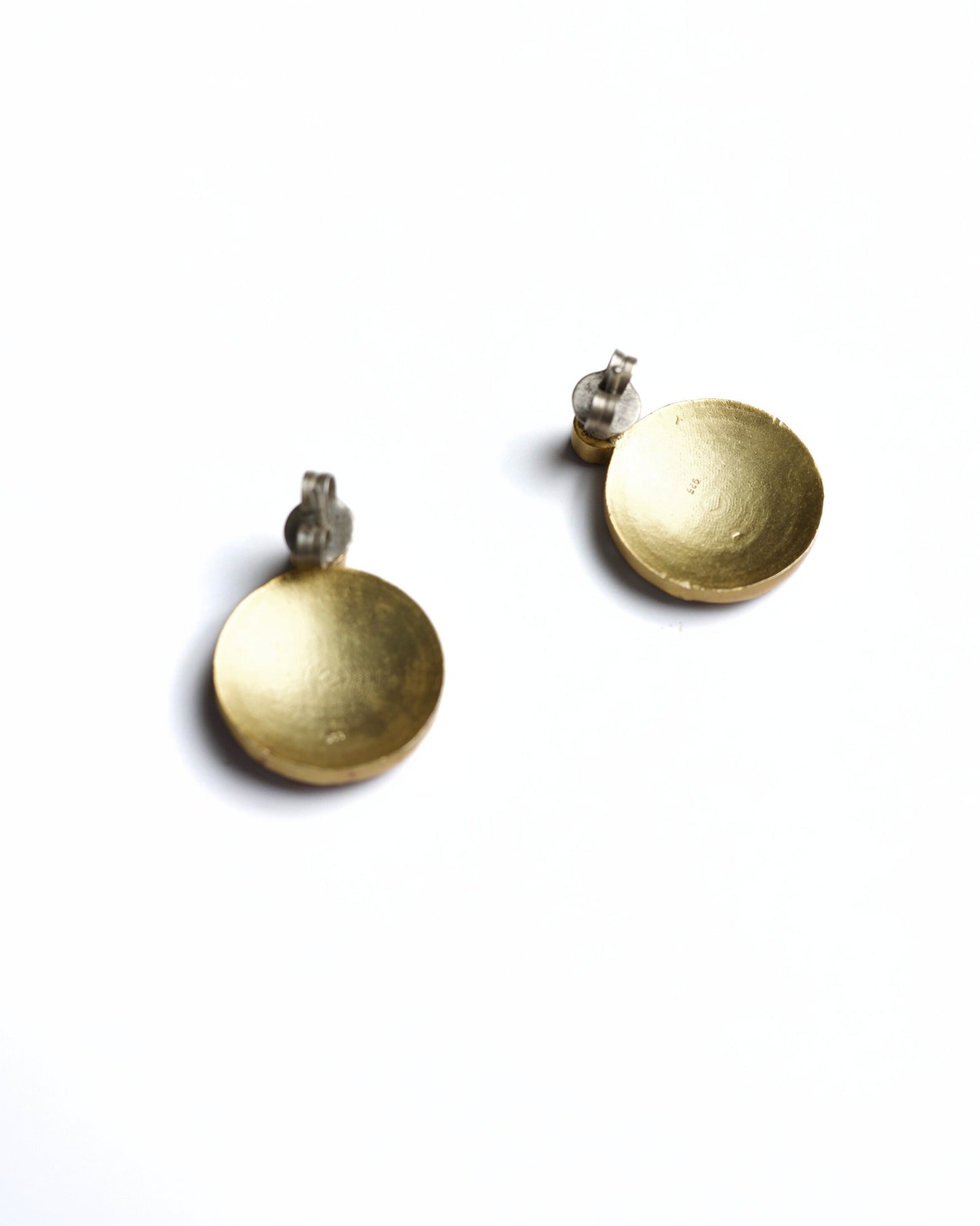 Round pink and white kundan stud earrings in gold polished 925 silver with green top stone accent.