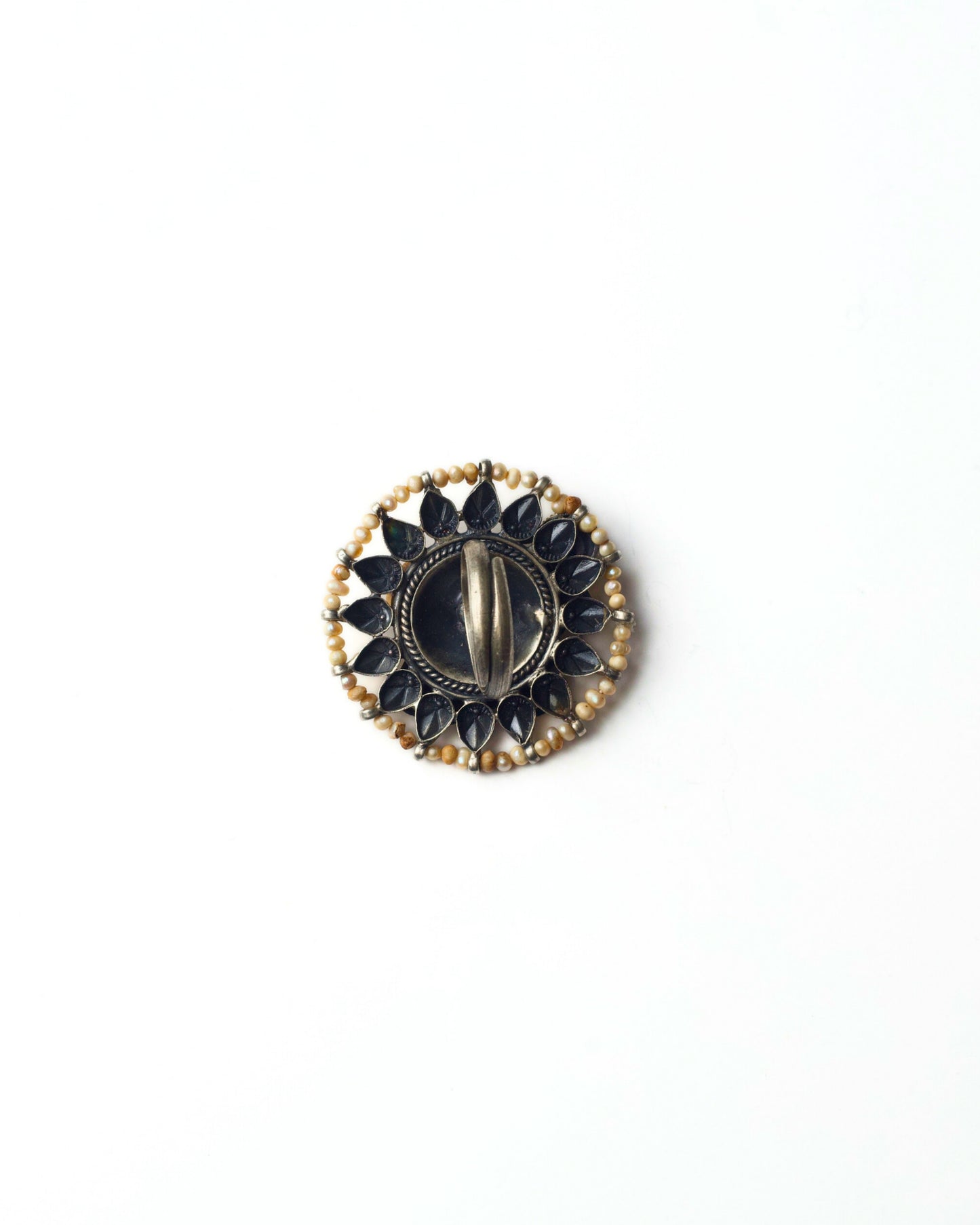 Back view of The Birdcourt Ring in 925 silver, showing the smooth ring shank and solid construction supporting the medallion face.