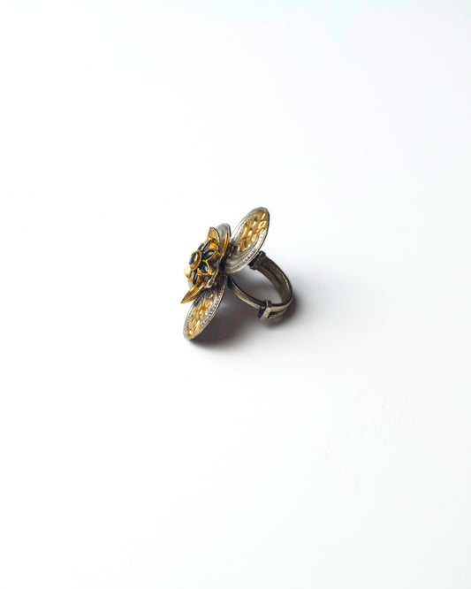 Side view of Tri-Petal Dual Ring in 925 silver showing raised petal structure and layered relief work