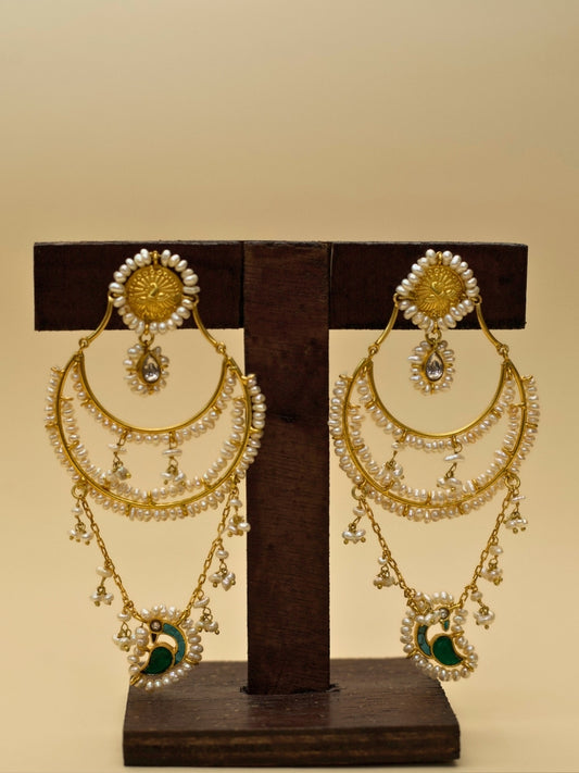 Chaand Re Jhumkas by Naksa—gold polished 925 silver earrings with layered pearl chains, green crescent drop, and faceted teardrop stone.