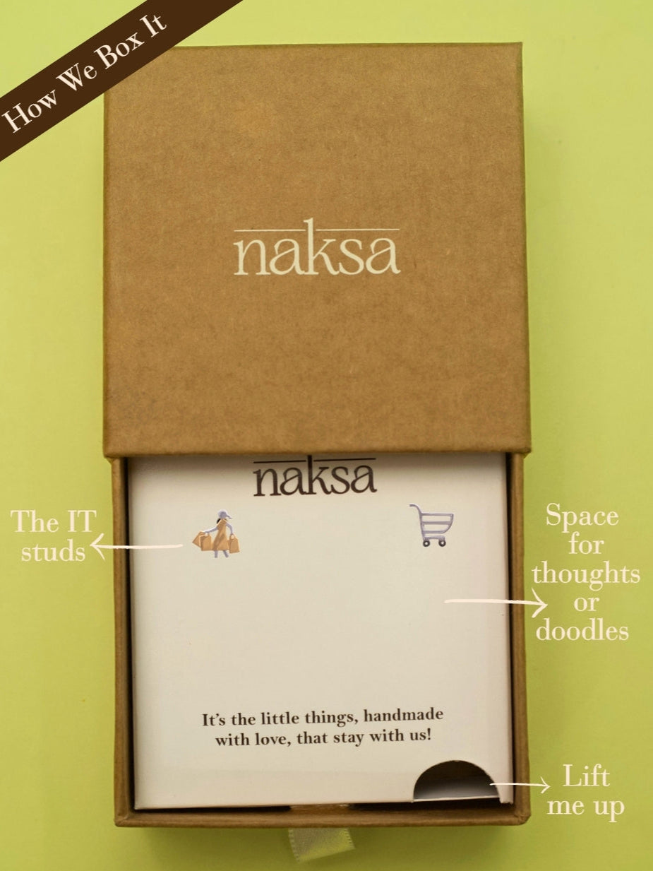 Cha-Ching Studs by Naksa—mismatched silver shopping cart and gold shopper earrings in pure 925 silver.