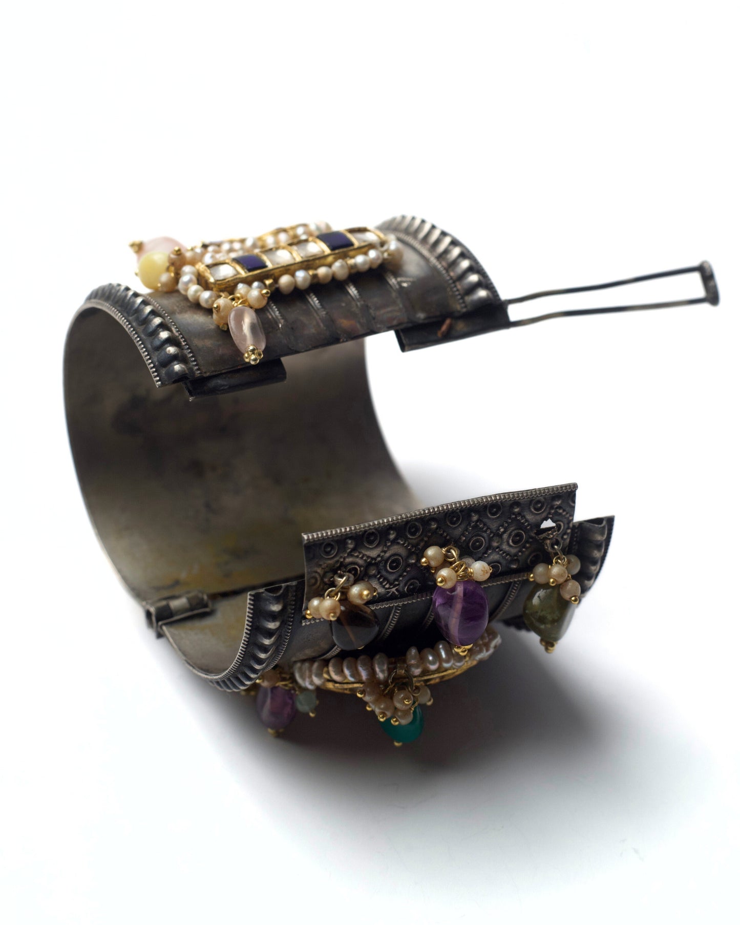 Back view of antique-finish 925 silver cuff highlighting hinged structure, aged metal texture, and handcrafted construction details.