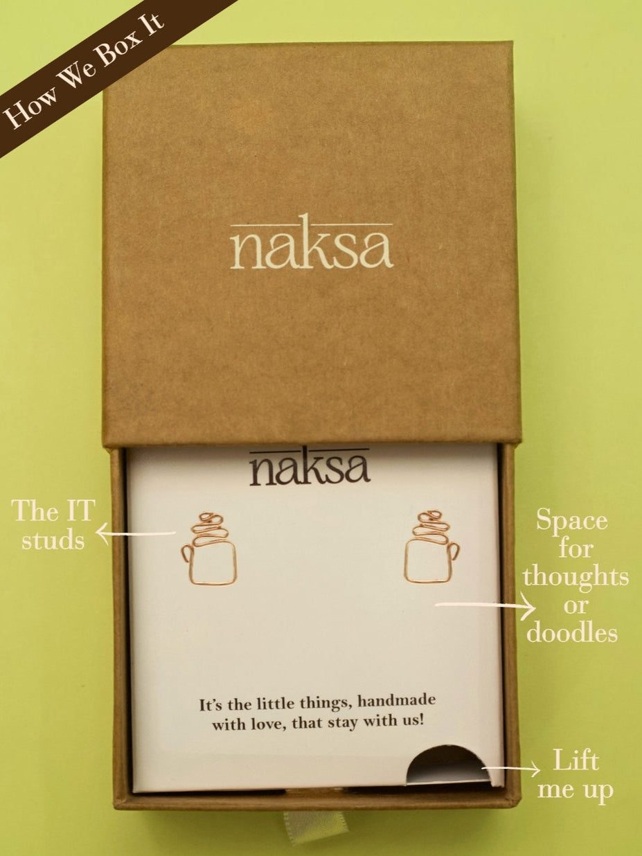Coffee Cuties by Naksa—abstract coffee mug earrings in gold-polished 925 silver with hand-twisted squiggle design.