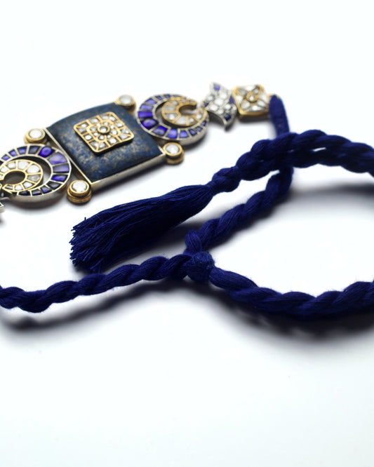 Back dori of silver lapis choker with crescent forms and square kundan accents