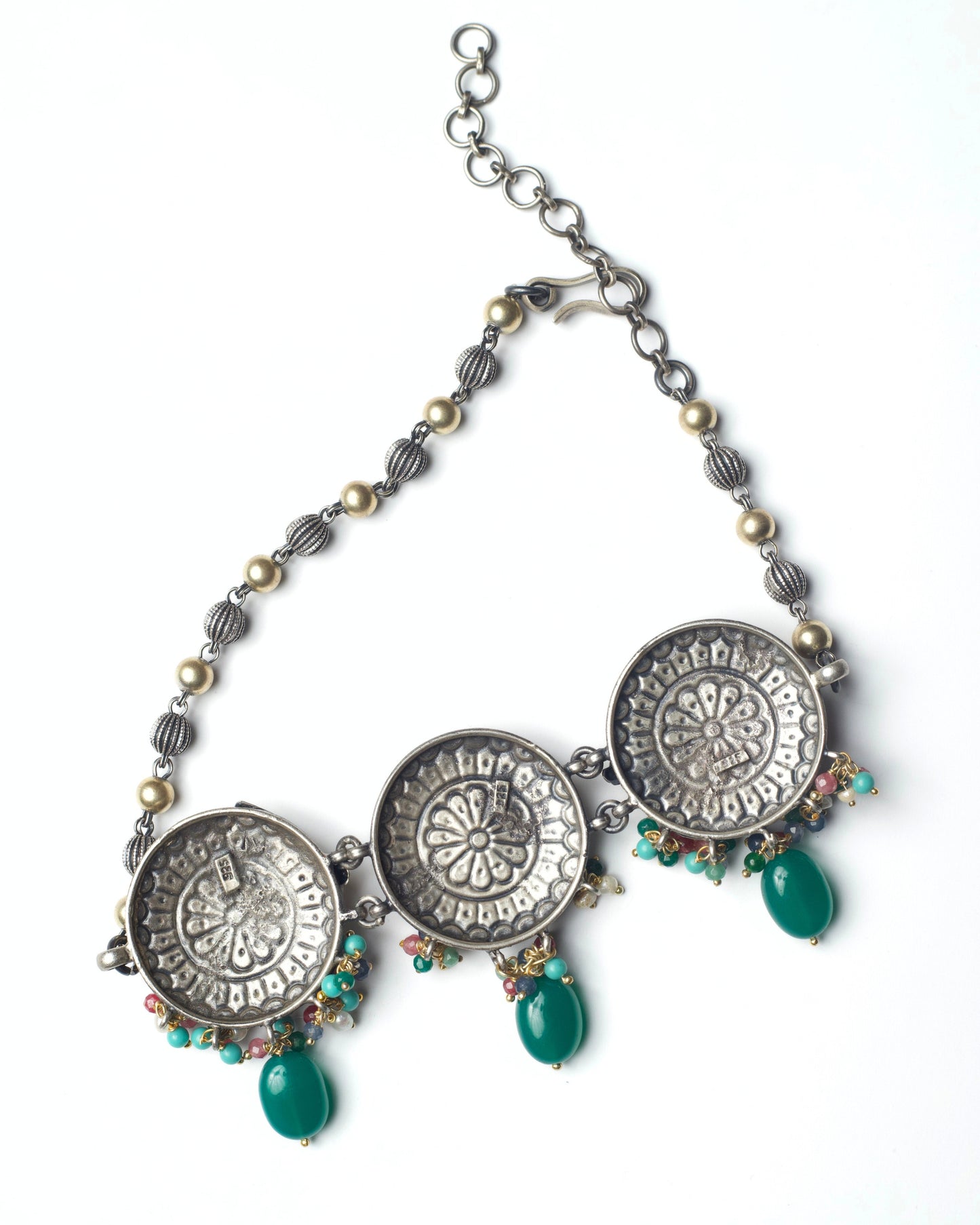 Back view of handcrafted three-panel silver choker with adjustable thread closure