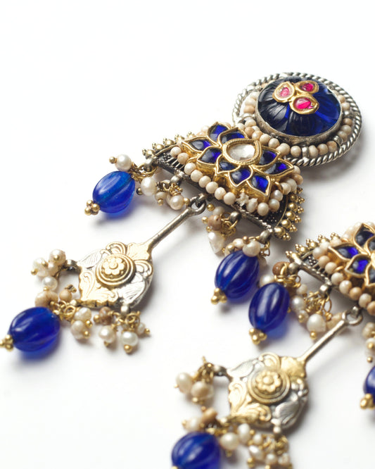 Zoomed shot of Cobalt Lotus Drops handcrafted in 925 silver with carved blue stones, pearl details, and lotus-inspired design