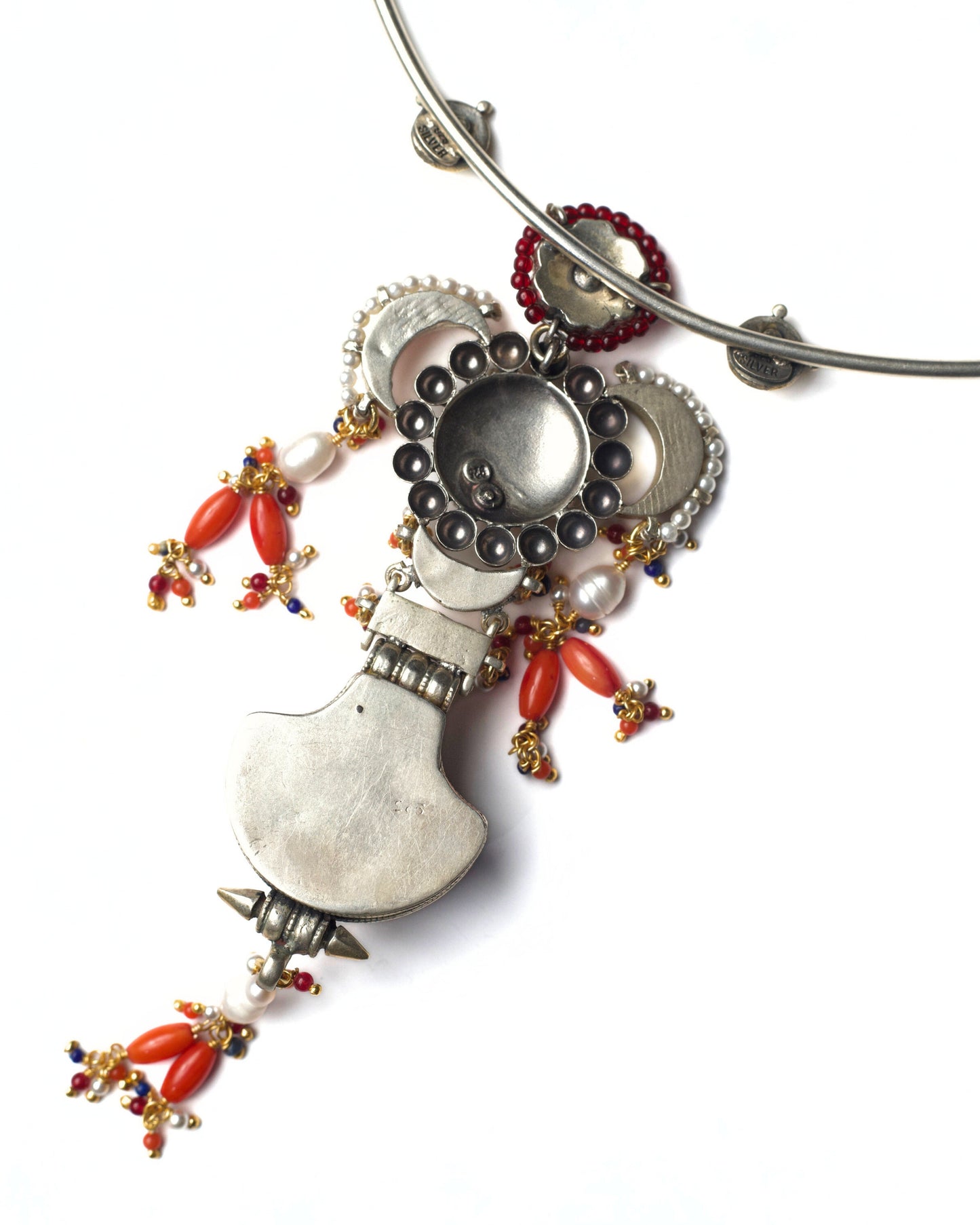 Back view of Fire Altar Hasli showing polished silver hasli structure and handcrafted detailing