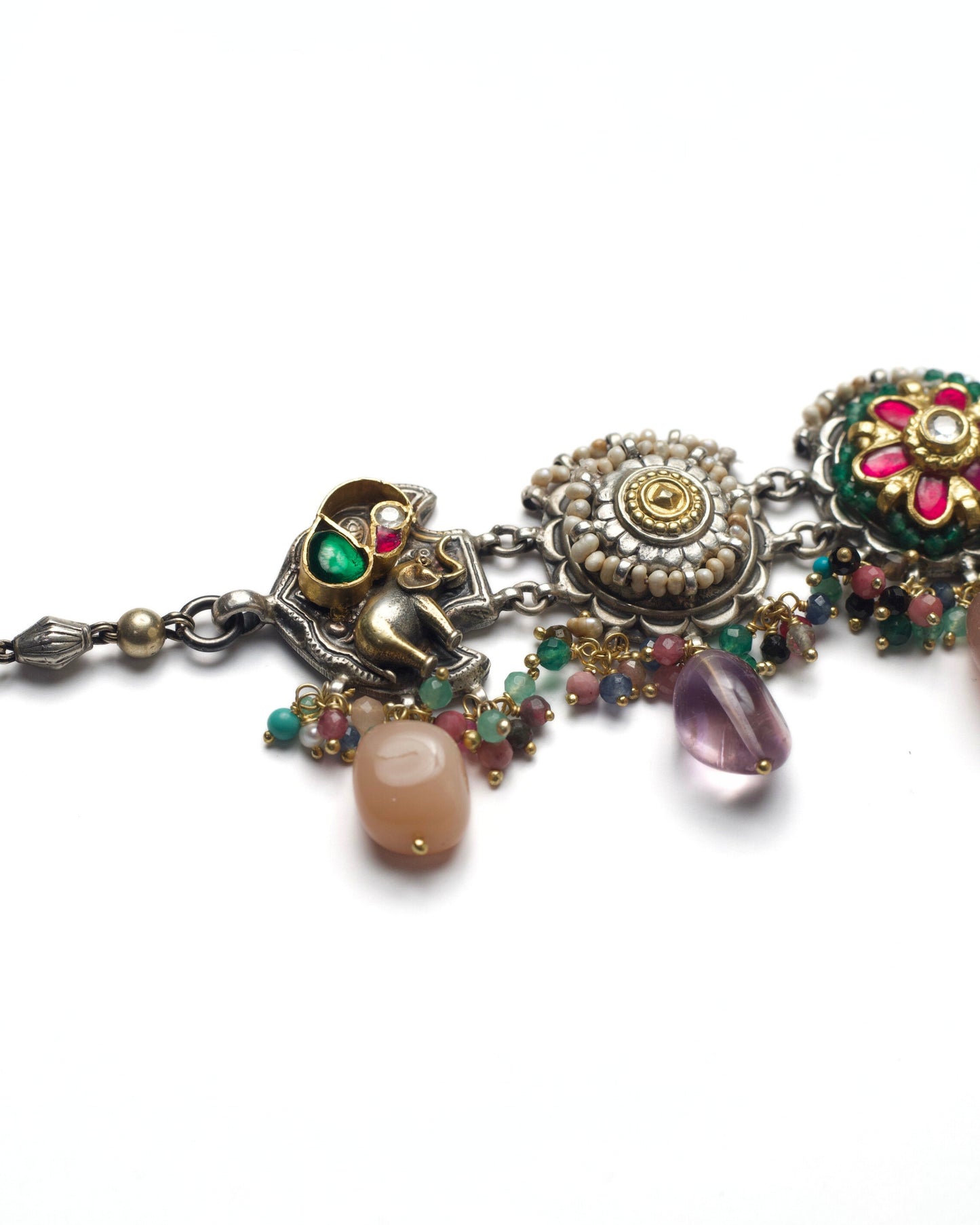 Zoomed view of handcrafted 925 silver oxidised choker with five panel design, elephant motifs, kundan floral centre, pearl detailing, and pastel gemstone drops
