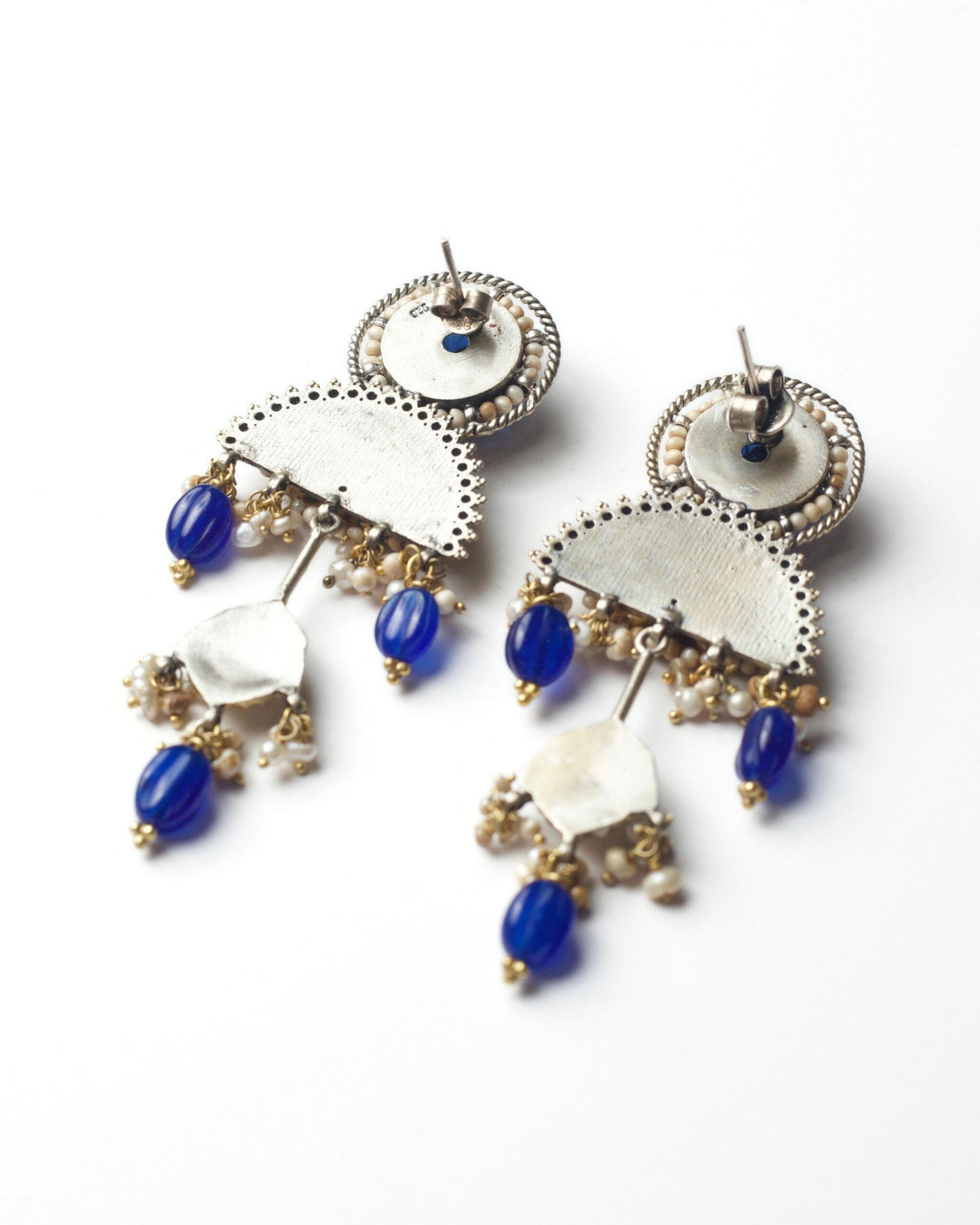 Back of Cobalt Lotus Drops handcrafted in 925 silver with carved blue stones, pearl details, and lotus-inspired design