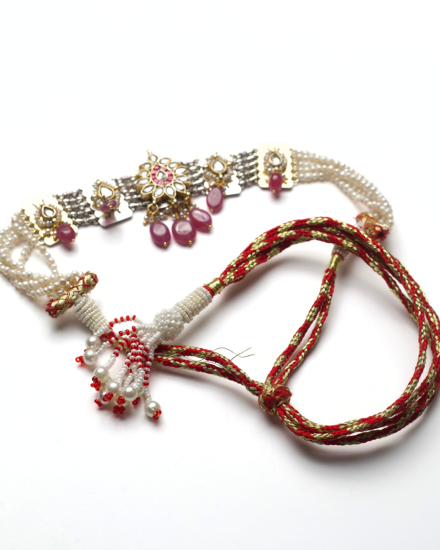 Oxidised silver kundan choker with floral rosette centre, pearl detailing, teardrop kundan accents, and ruby stone drops and dori