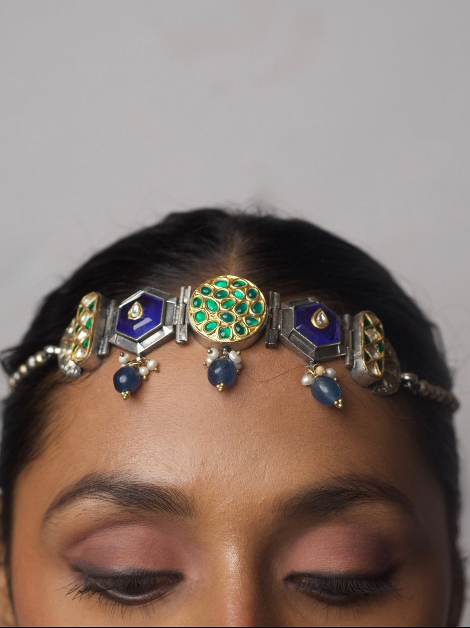 92.5 silver choker necklace with geometric blue enamel, green kundan motifs, and pearl-tipped blue drops; fusion statement jewelry from Naksa.