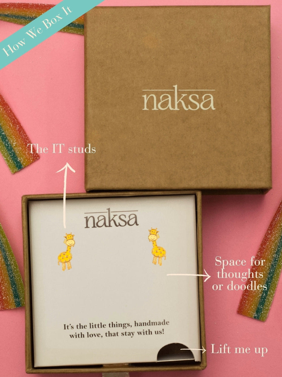 Giraffe Giggles Studs by Naksa—baby giraffe enamel earrings in gold-polished 925 silver with hand-detailed yellow finish.