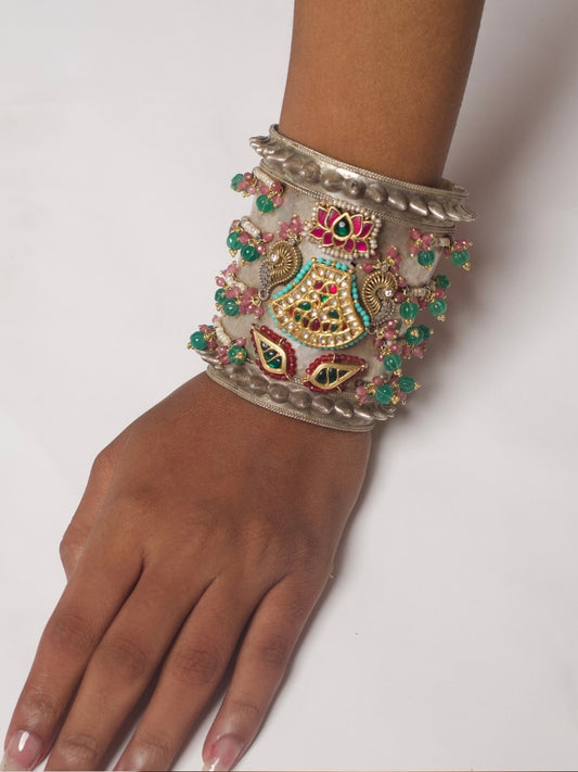 Vintage tribal fusion cuff with kundan goddess motifs, pearl-lined silhouette, and floral beadwork – Naksa Jewelry