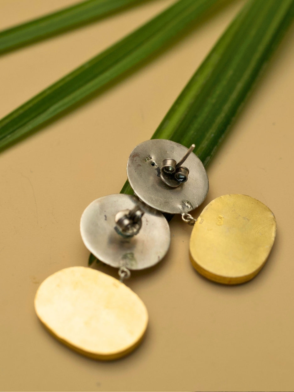 925 silver Surya Rekha Earrings with gold polish two-tone carvings, and orange Kundan drops – Naksa heritage jewelry