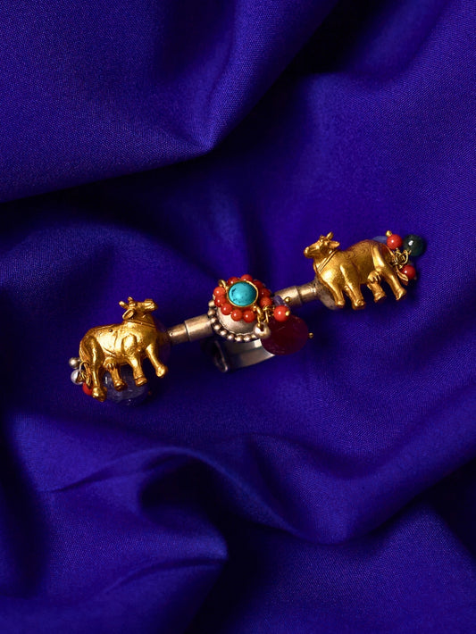 Twin Guardians Ring in 92.5 silver featuring two gold-plated cow motifs with coral and turquoise detailing, handcrafted tribal-fusion statement ring by Naksa