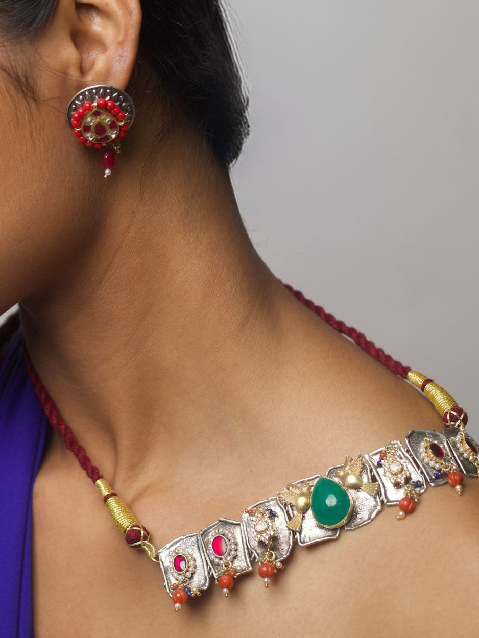 Fusion festive choker and earring set in silver, worn with a deep blue drape – The Song of Spring Set