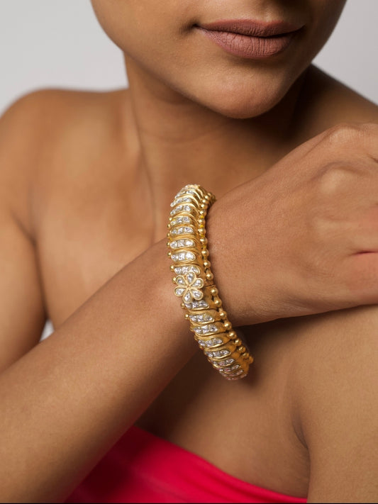 Flexible kundan bangle with floral motif in pure 92.5 silver, openable royal kada design.