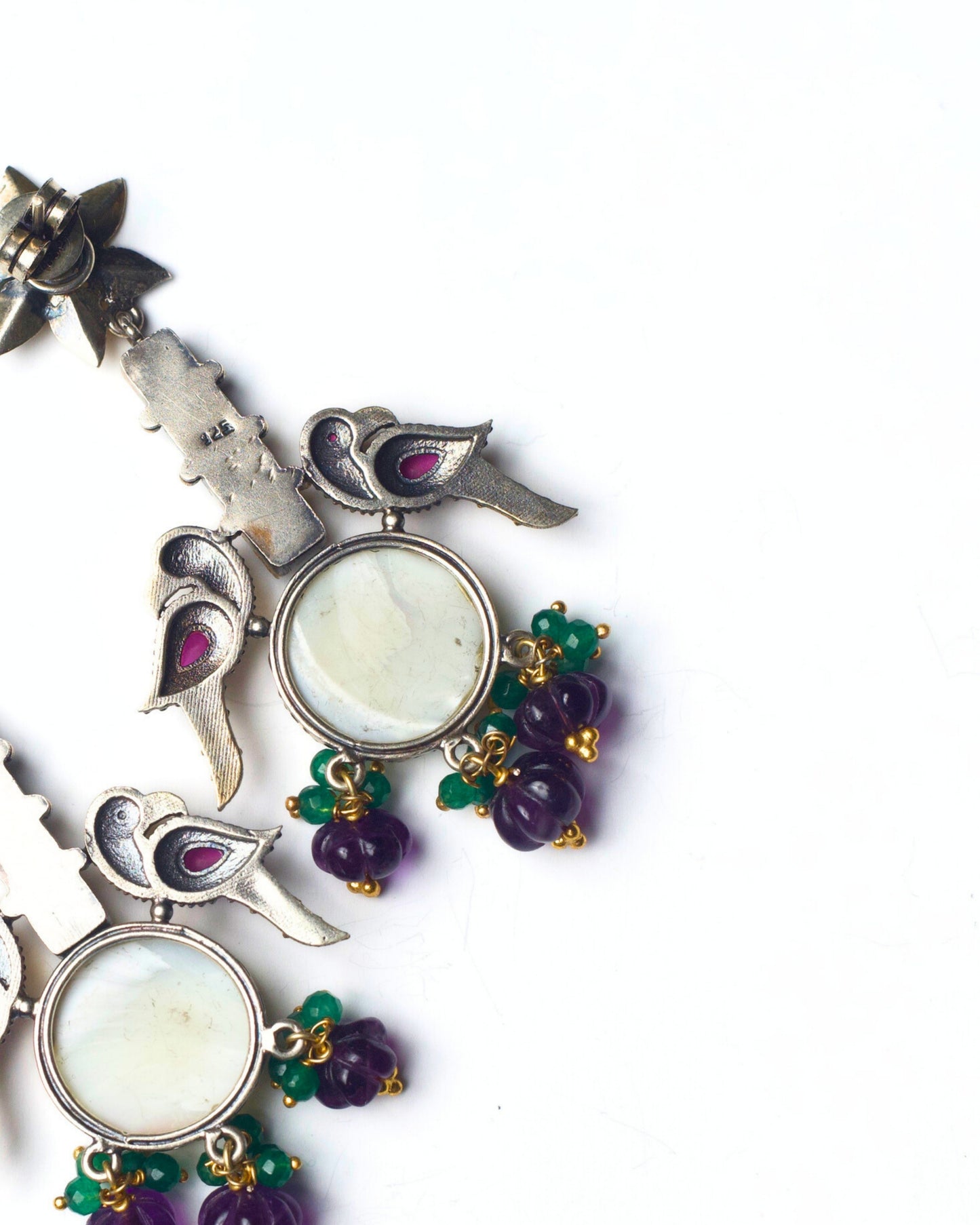 Back view of The House of Birds Earrings showing structured metal framework, secure stone settings, and balanced craftsmanship