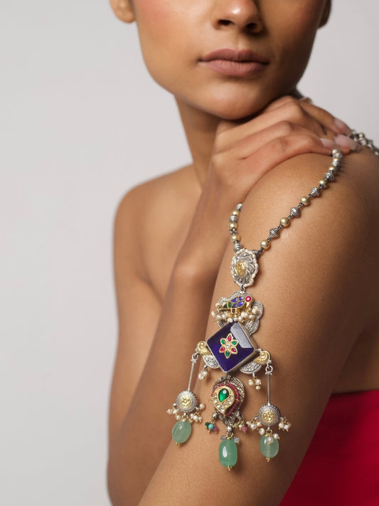 Long pure silver necklace with enamelled blue-green pendant, kundan stone setting, and layered danglers in pearls and green stones
