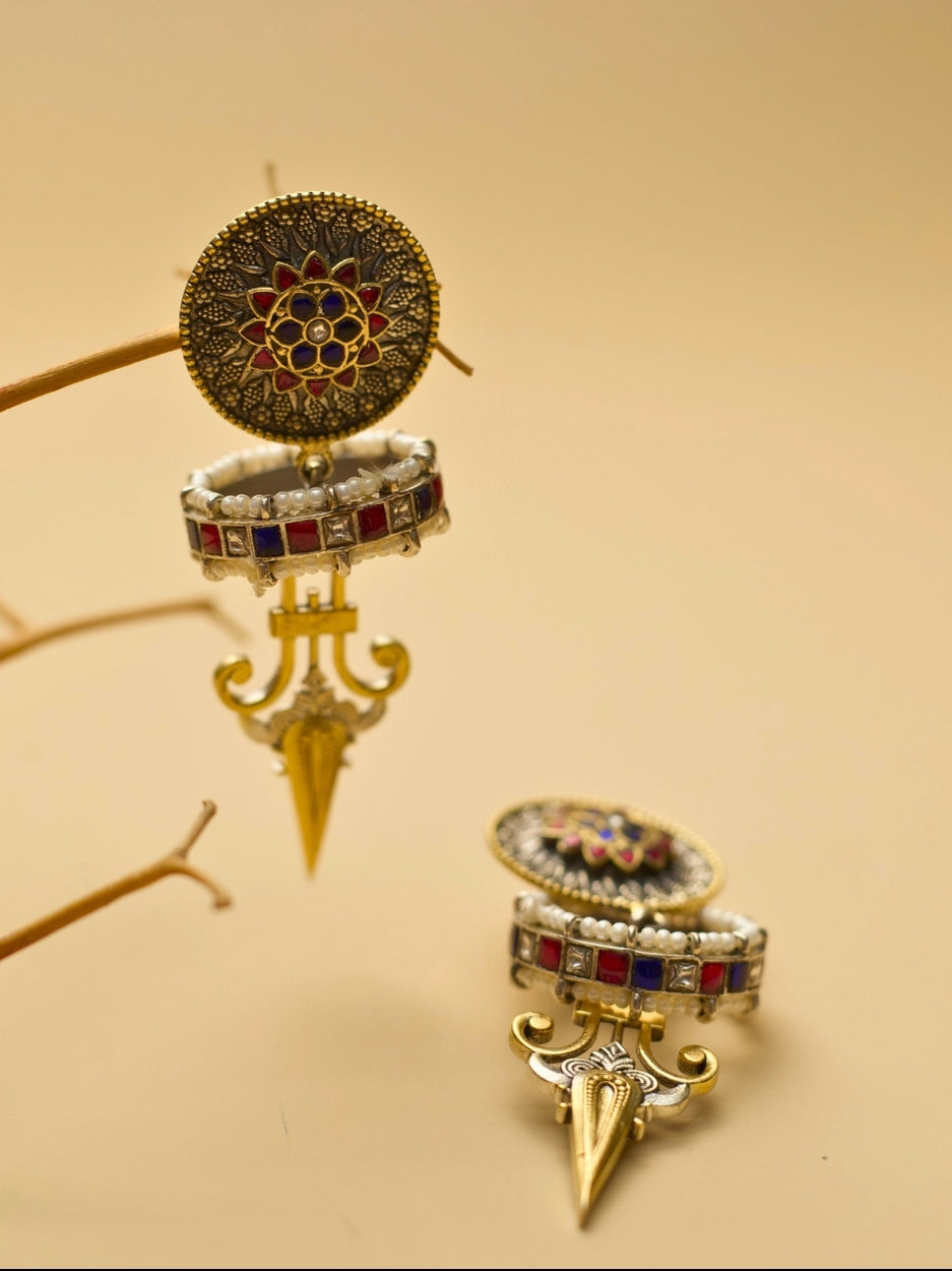 Triumph Bloom Earrings – Ruby Sapphire Glow, featuring detailed two-tone kundan artistry and bold 3D motifs by Naksa.