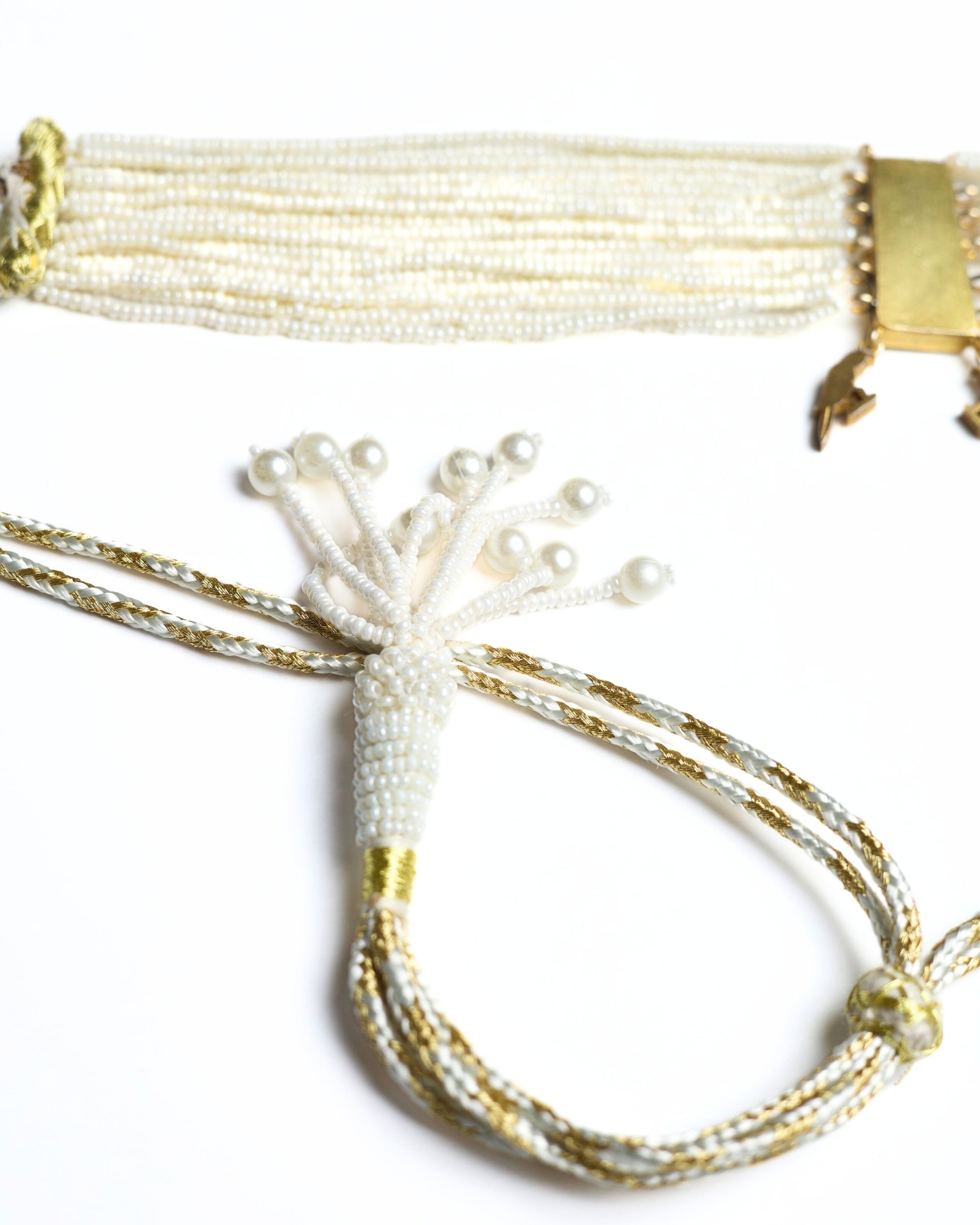925 silver pearl choker with gold polish, blue enamel and kundan-style floral centre, featuring two small bird charms