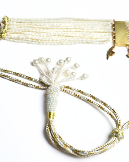 925 silver pearl choker with gold polish, blue enamel and kundan-style floral centre, featuring two small bird charms