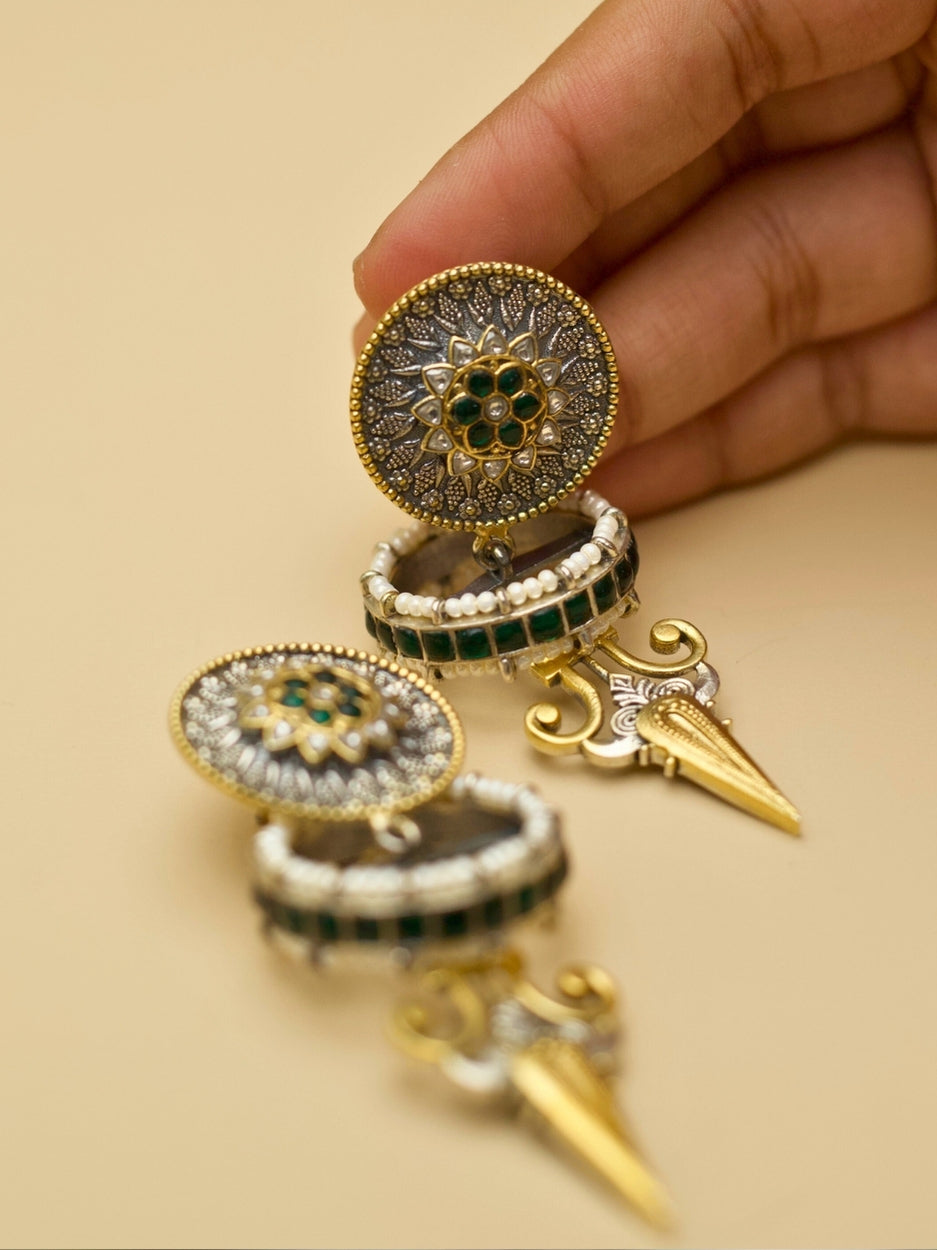 Triumph Bloom Earrings – Emerald Aura, with intricate kundan two-tone work and 3D circular design by Naksa.