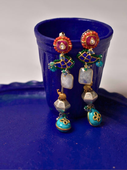 Long 92.5 silver fusion earrings with kundan red tops, faceted beads, turquoise floral drops, and handcrafted multicolor details
