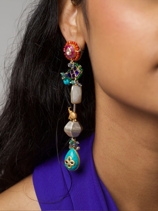Long 92.5 silver fusion earrings with kundan red tops, faceted beads, turquoise floral drops, and handcrafted multicolor details