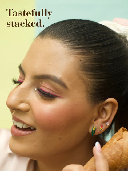 Sweet Slurprise Studs by Naksa—fun popsicle-shaped earrings in pink and orange enamel on 92.5 silver, inspired by summer slush and chuski love.