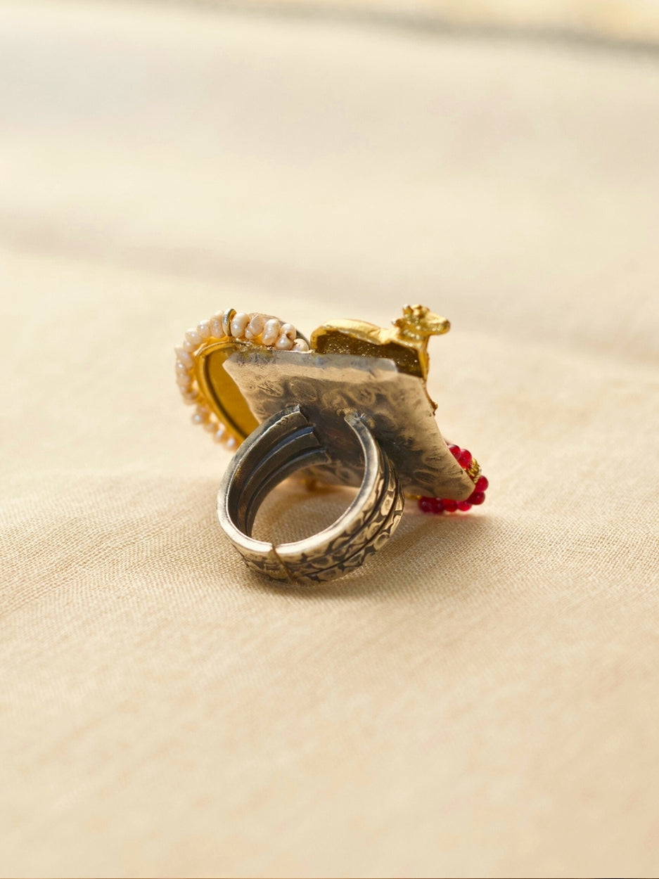 Statement 925 silver ring with elephant motif, tiger’s eye, kundan, and red beads – worn by Ila Arun.