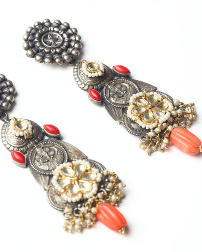 Handcrafted silver floral earrings with pearl accents and coral drop