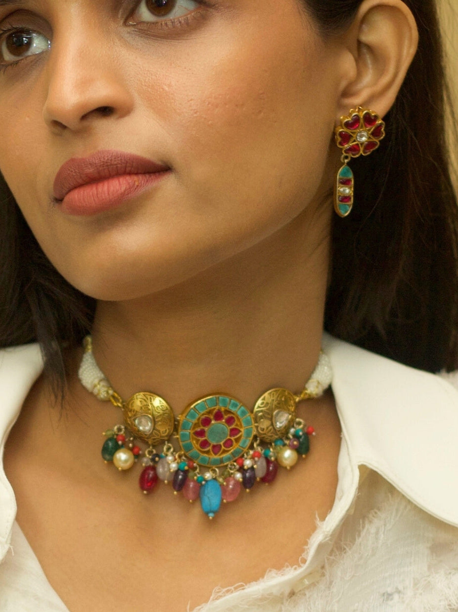 Sweet Defender choker set in pure 925 silver with gold polish, candy-toned stones, and heart-shaped earrings in teal and pink by Naksa.