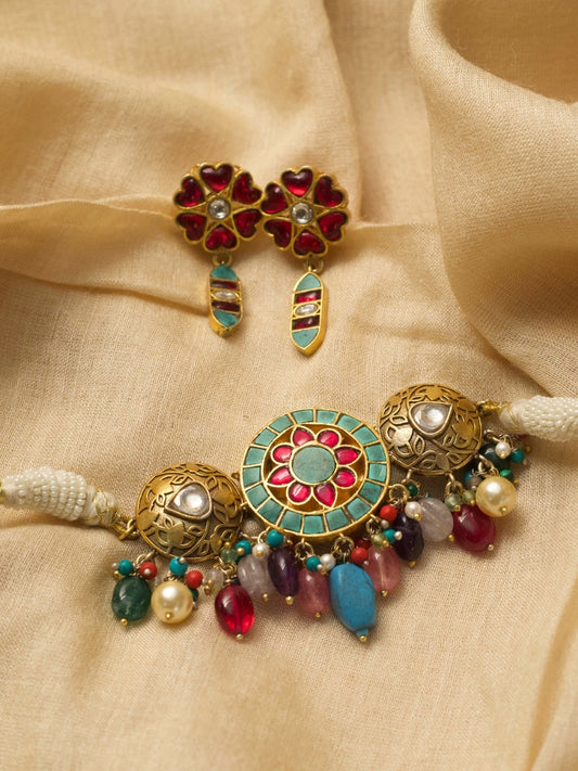 Sweet Defender choker set in pure 925 silver with gold polish, candy-toned stones, and heart-shaped earrings in teal and pink by Naksa.