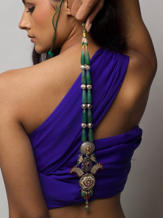 Long handcrafted 92.5 silver necklace with eclectic circular pendants, enamel, moissanite, temple and floral motifs.