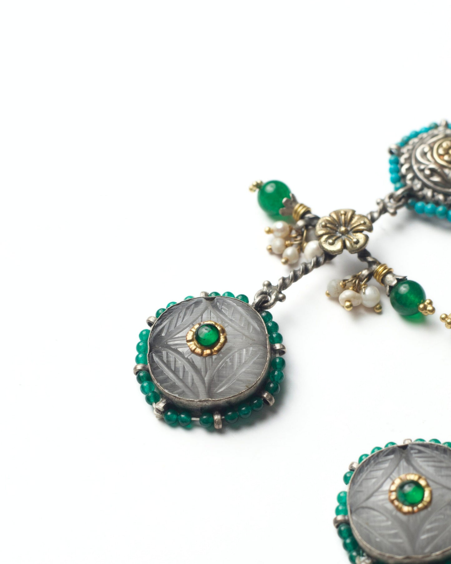 Carved stone cross-form earrings in 925 silver