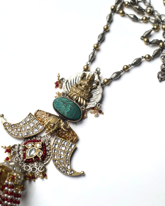 Close-up of Hanging Sanctum Necklace highlighting kundan-set curves, carved silver elements, and bead detailing