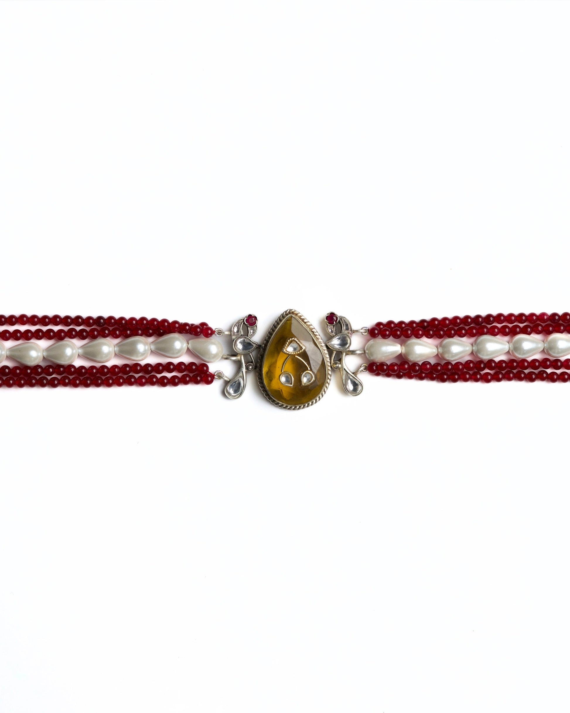 Multi-strand red bead choker in 925 silver with gold polish, pearl accents, and a large honey-toned teardrop stone centre pendant.